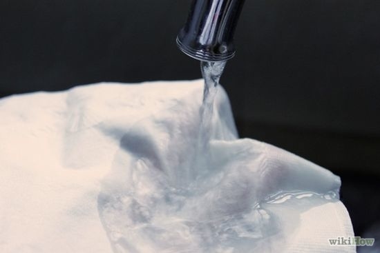 Get another paper towel/Kleenex and wet it.